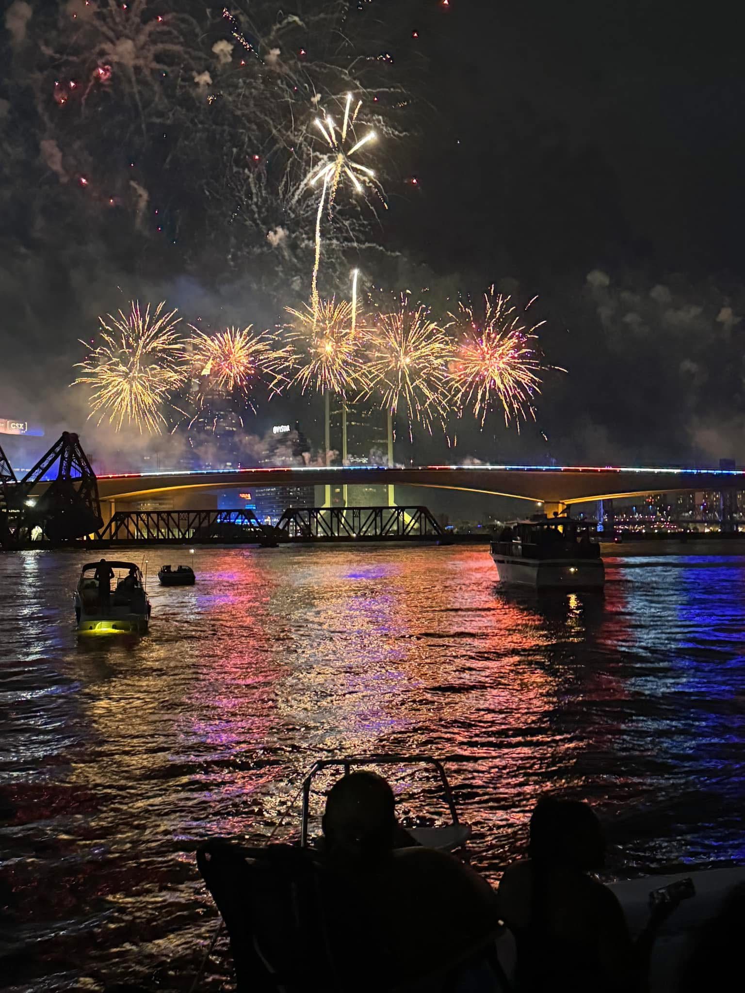 Fireworks over the St Johns River viewed from the deck of Now and Zen catamaran Jacksonville