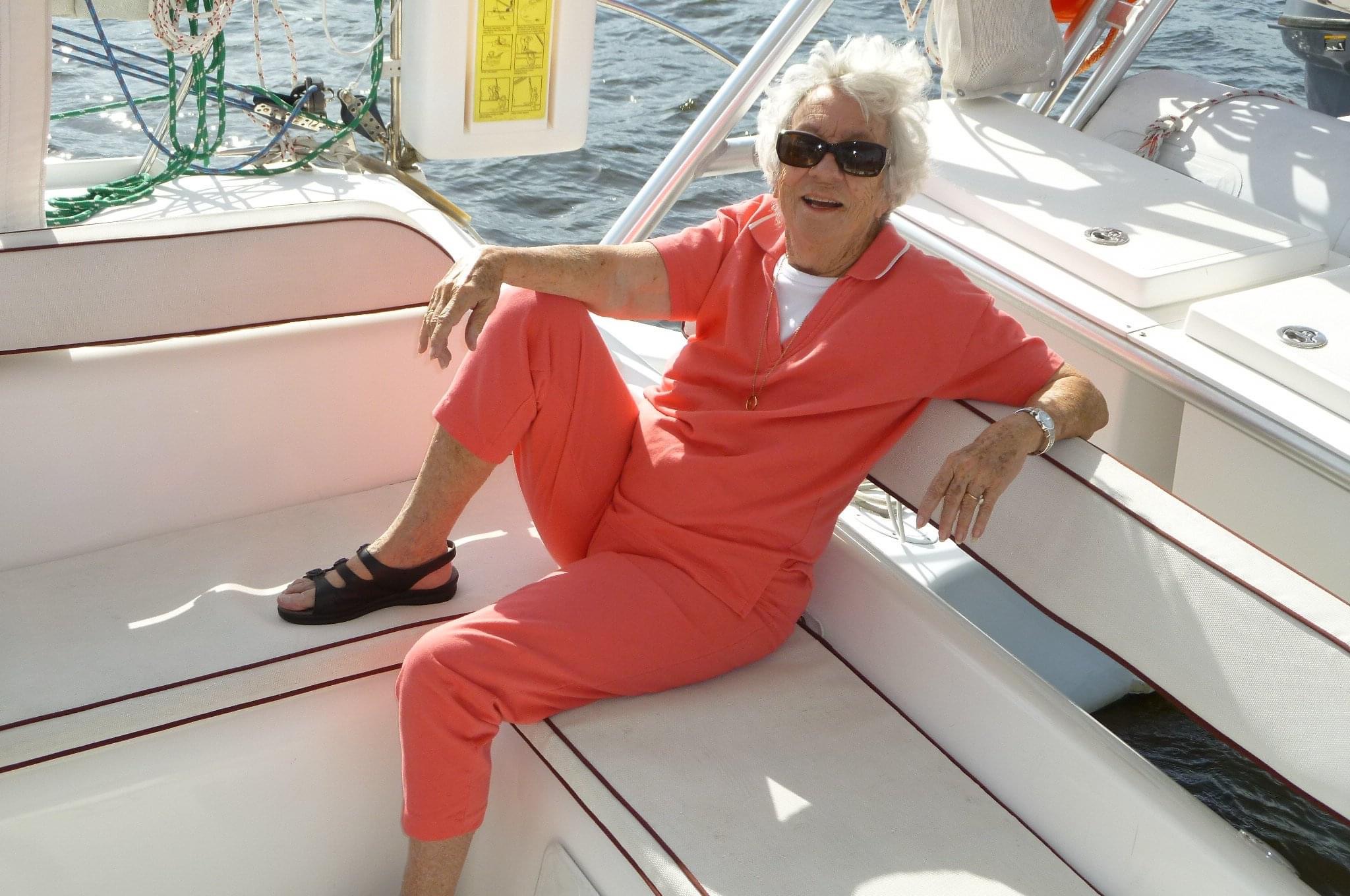 Happy guest relaxing on the deck of Now and Zen catamaran on the St Johns River Jacksonville