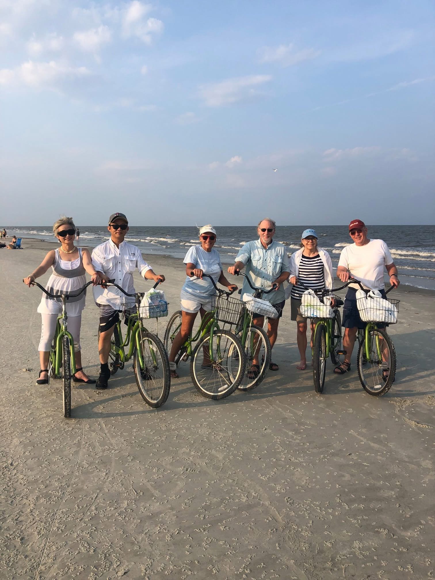 Group biking on the beach at Jekyll Island Georgia